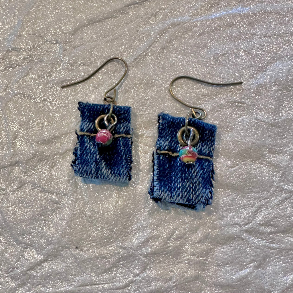 Handmade blue denim fabric earrings with vintage brass hypoallergenic metal hooks and small colorful bead charms.  75” long without hooks. Casual, petite and fun to wear!

